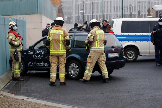 Car crashed into the gate of the office of German Chancellor Angela Merkel in Berlin