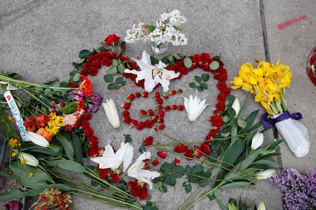 Protesters gather at the scene where Floyd was pinned down by a police officer in Minneapolis