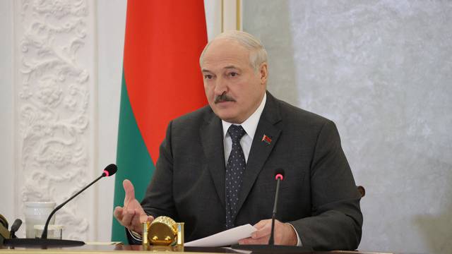 Belarusian President Lukashenko chairs a meeting with members of the Security Council in Minsk