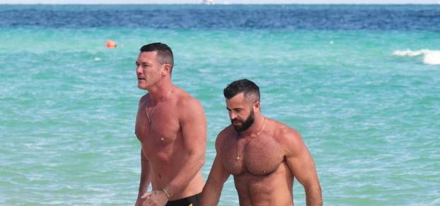 *EXCLUSIVE* Luke Evans hits the beach with his hunky boyfriend Fran Tomas in Miami!