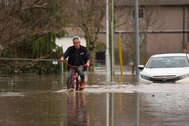 Floodwaters trigger evacuations and highway closures in British Columbia's Fraser Valley
