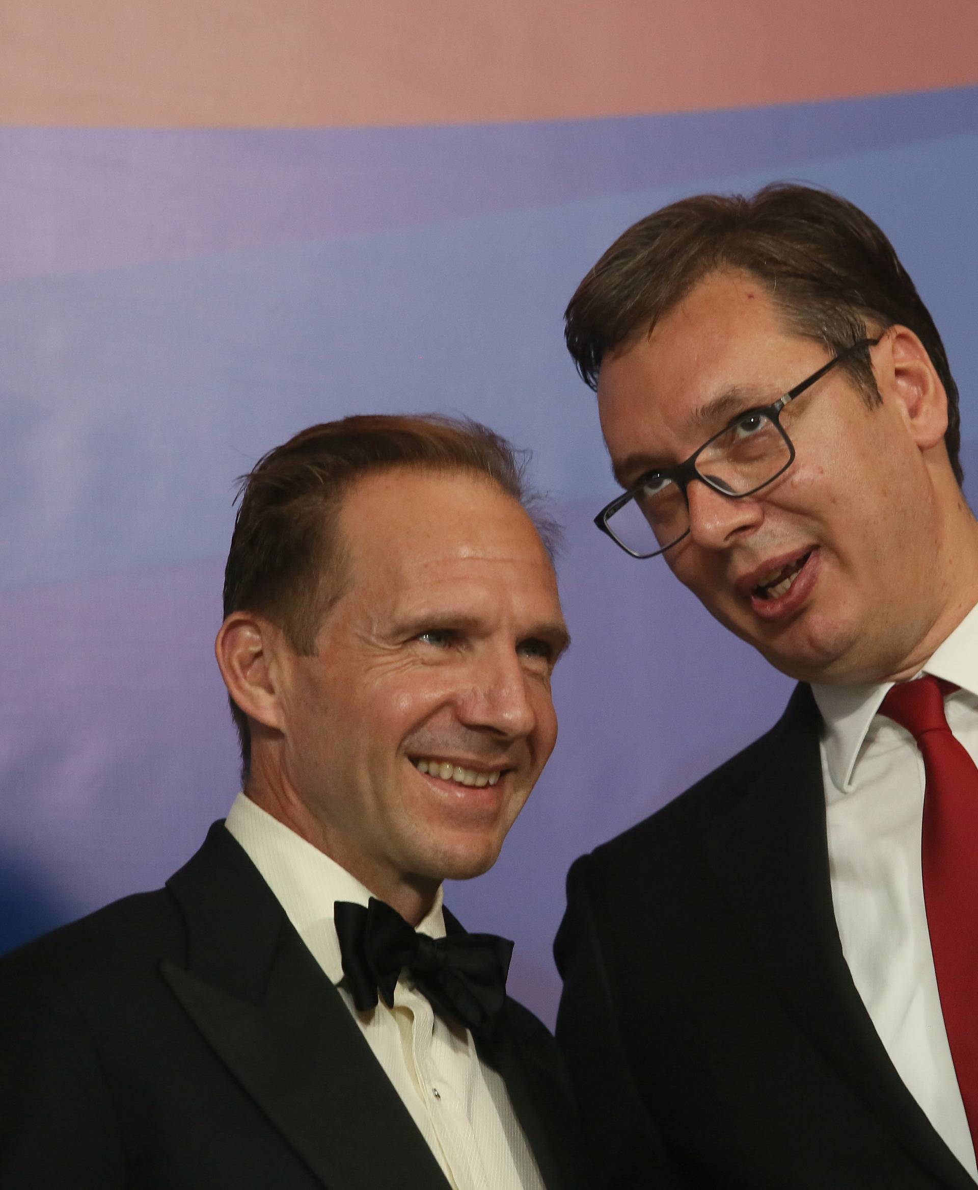 Serbia's President Aleksandar Vucic and actor Ralph Fiennes attend an inauguration ceremony in Belgrade