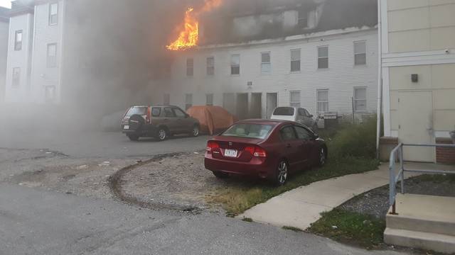 Photo from social media by Boston Sparks shows a building burning after explosions in Lawrence, Massachusetts