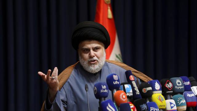 Iraqi Shi'ite cleric Muqtada al-Sadr speaks during a news conference in Najaf