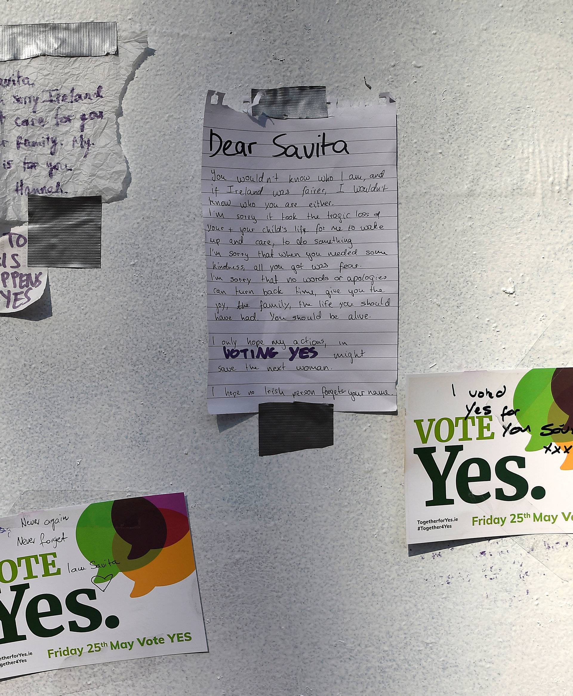 Messages are left on the wall at a mural of Savita Halappanavar put up on the day of the Abortion Referendum on liberalising abortion laws in Dublin