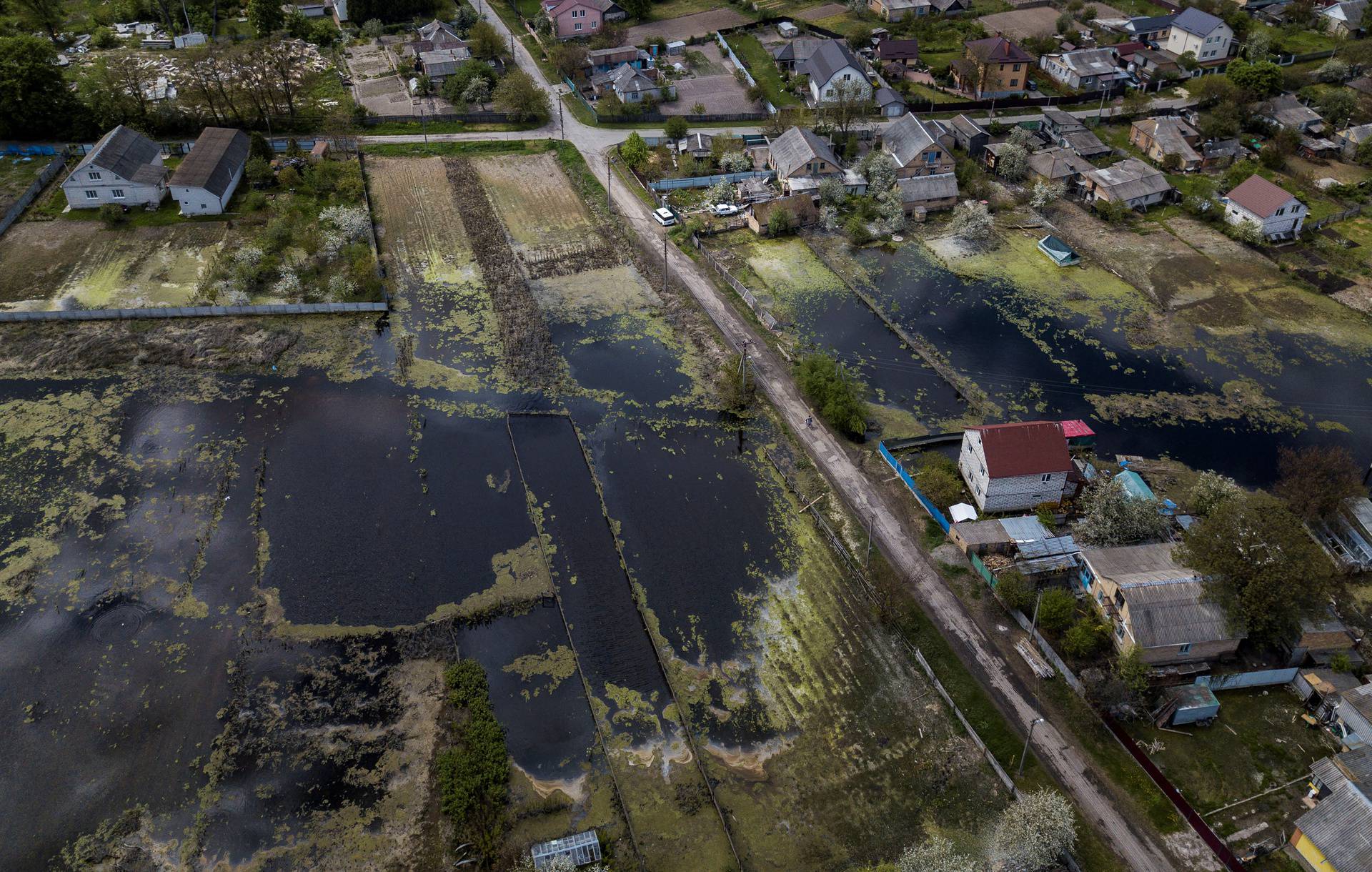 Houses are seen at a flooded area after Ukrainian military forces opened a dam to flood an residencial area in order to stop advance of Russian forces to arrive to the capital city of Kyiv, in Demydiv, Ukraine