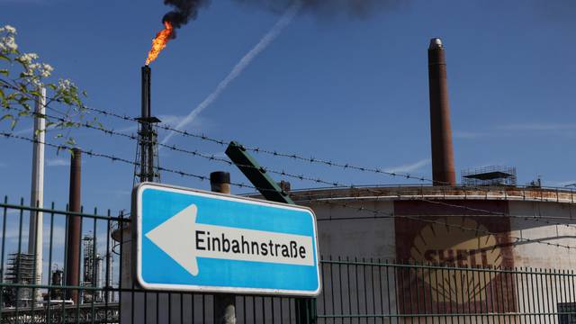 A pilot flame burns atop Shell Energy and Chemicals Park Rhineland near Cologne