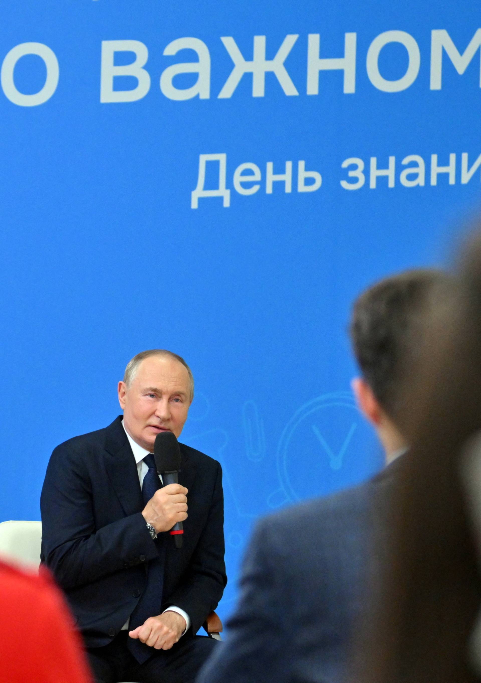 Russian President Putin delivers a lesson at Kyzyl school