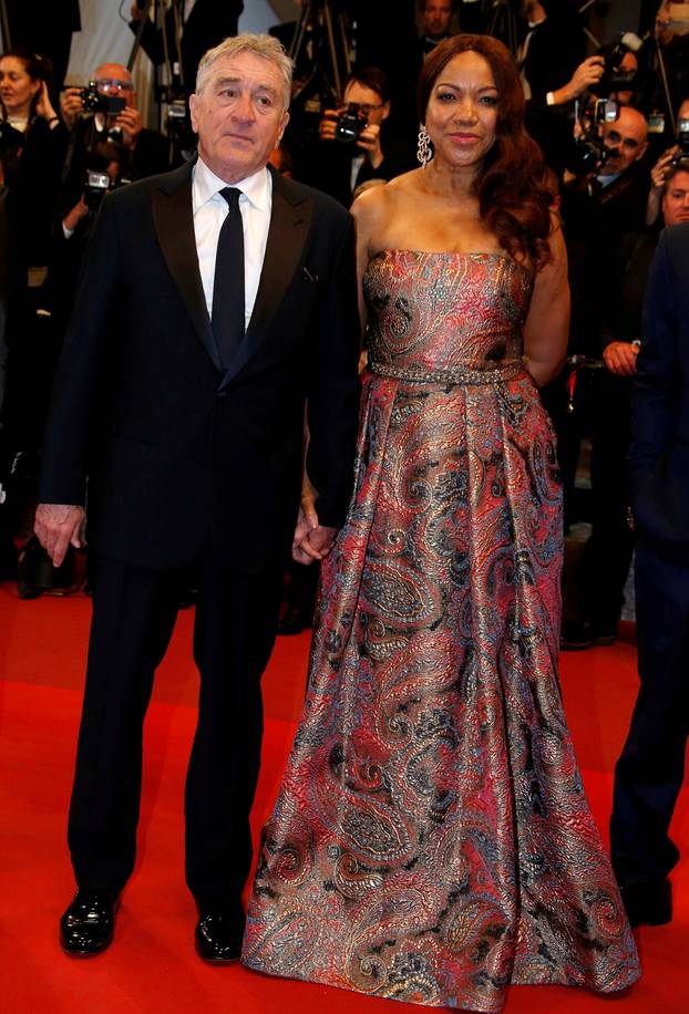 FILE PHOTO: Cast member Robert De Niro and his wife Grace Hightower pose on the red carpet as they arrive for the screening of the film "Hands of Stone" out of competition at the 69th Cannes Film Festival in Cannes