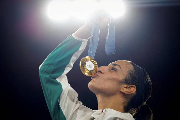 FILE PHOTO: FILE PHOTO: Gold medallist Imane Khelif of Algeria kisses her medal at the Paris 2024 Olympics