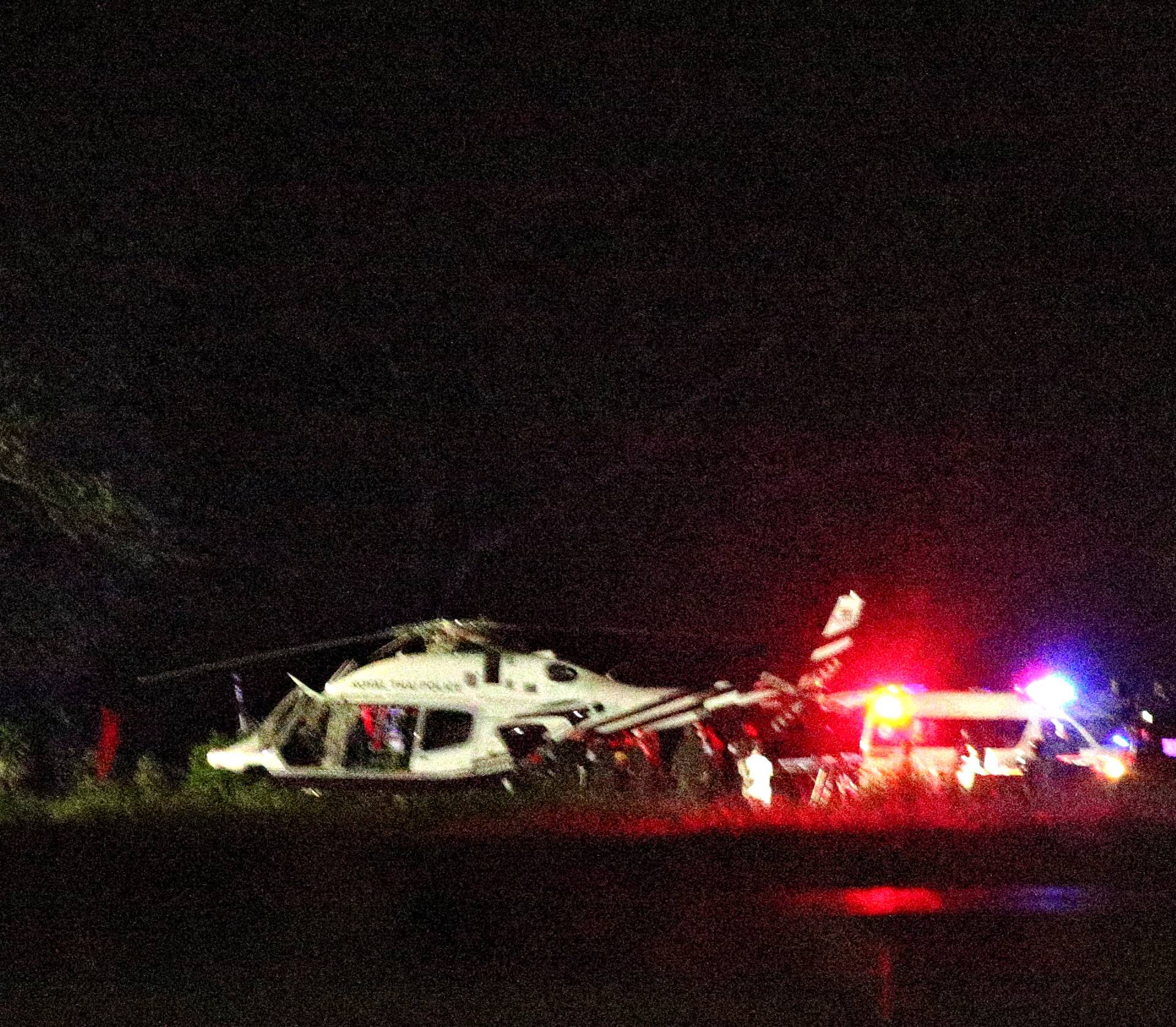 A Royal Thai Police helicopter carrying rescued schoolboys lands at a military airport in the northern province of Chiang Rai