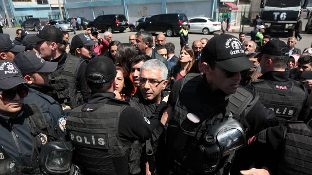 Turkish riot police prevent supporters of pro-Kurdish HDP to gather outside Baglar Municipality to protest against YSK in Diyarbakir