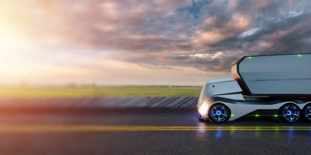 Unmanned autonomous cargo transportation. An autonomous, electric, self-driving truck with a trailer moves along the road. Fast cargo delivery, transportation without drivers.