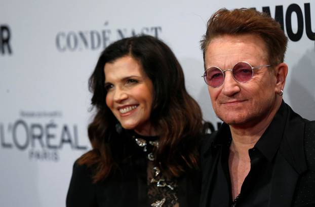 Recording artist and honoree Bono of U2 and his wife Ali Hewson pose at the Glamour Women of the Year Awards in Los Angeles