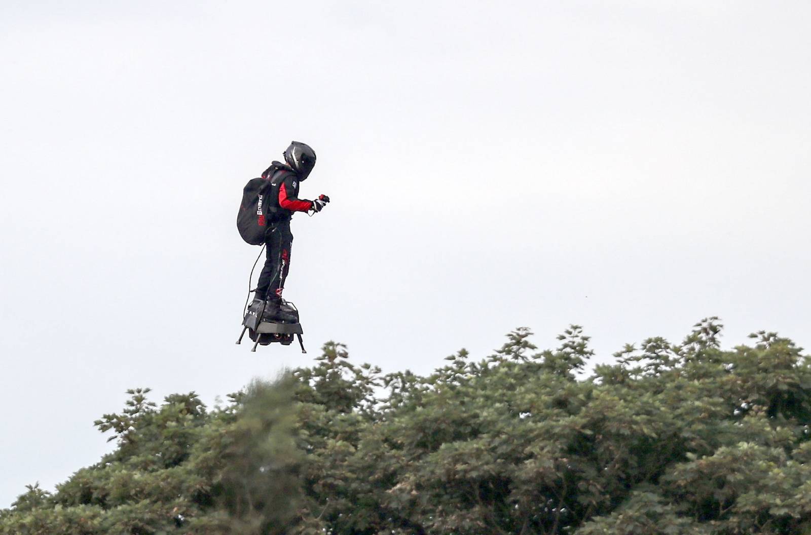 Jet-powered hover-board channel crossing