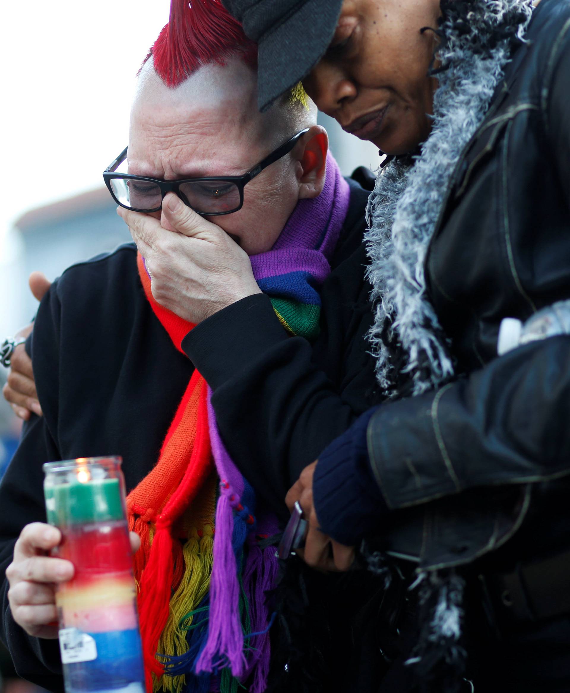 Trashina Cann and Vixen Noir, both of San Francisco, attend a candlelight vigil for the victims of the Orlando attack against a gay night club, held in San Francisco