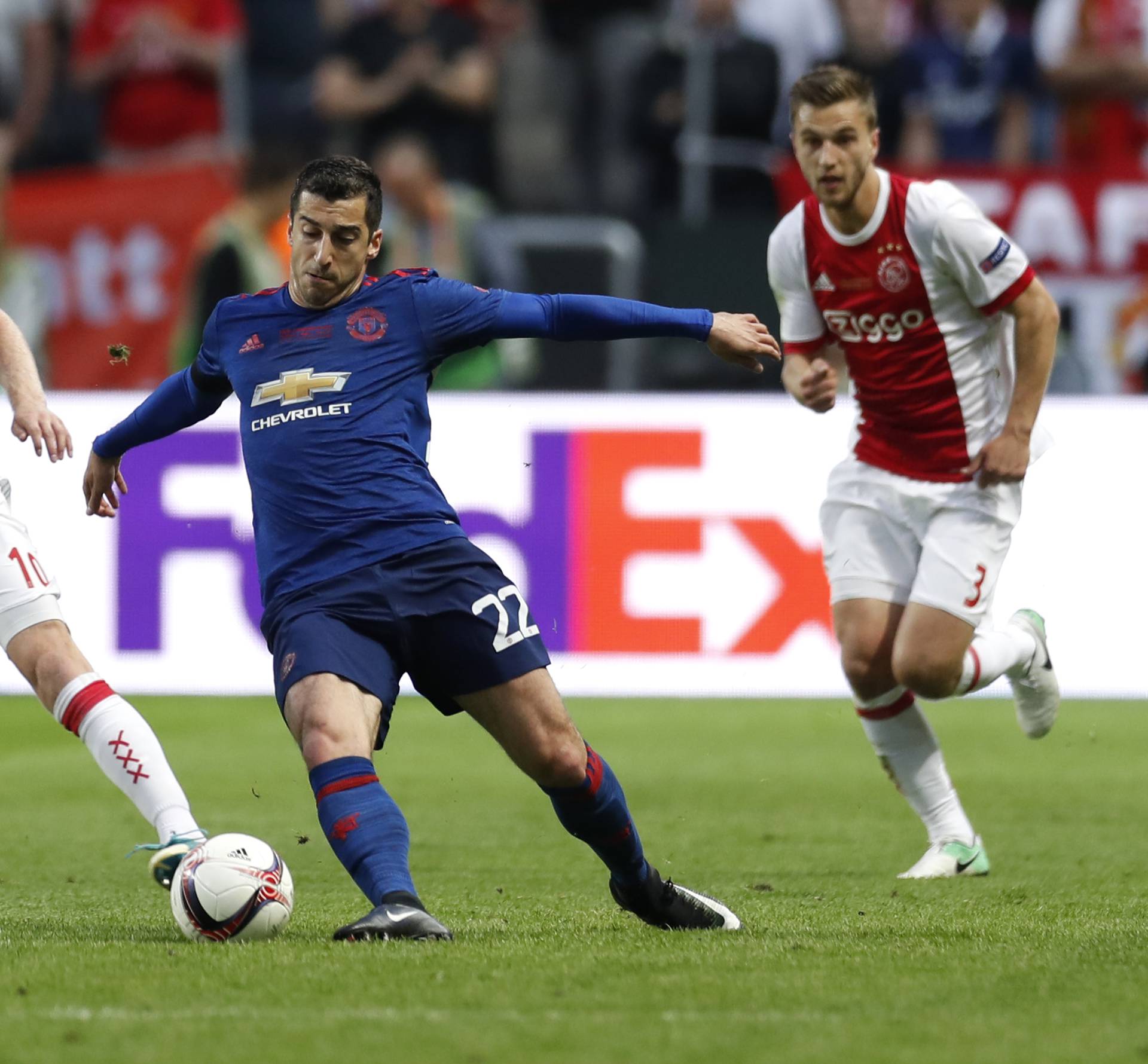 Manchester United's Henrikh Mkhitaryan in action with Ajax's Davy Klaassen