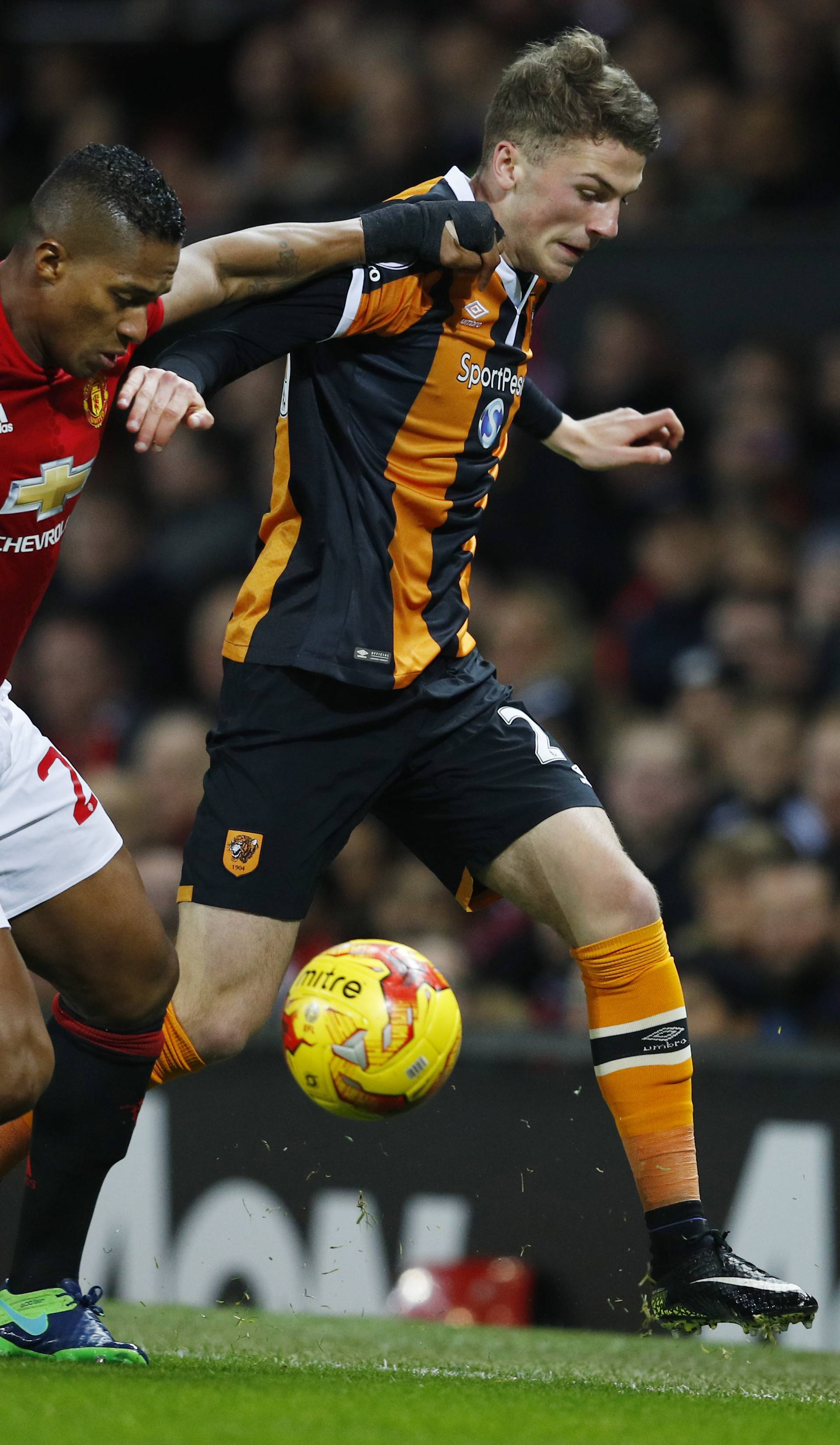 Manchester United's Antonio Valencia in action with Hull City's Josh Tymon