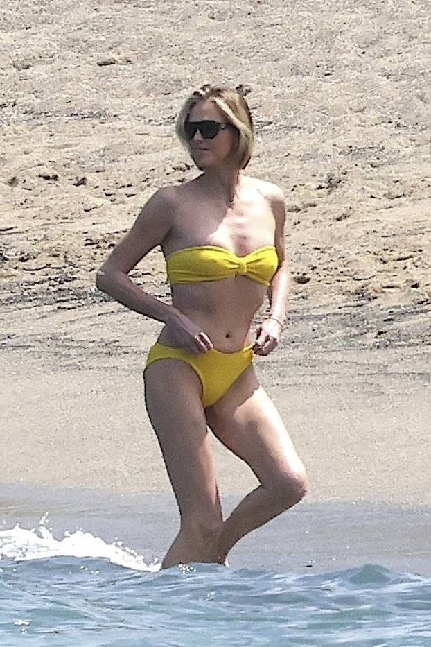 *PREMIUM-EXCLUSIVE* Charlize Theron, 50, Sizzles in Sunshine Bikini — Still Got It (and Then Some!)