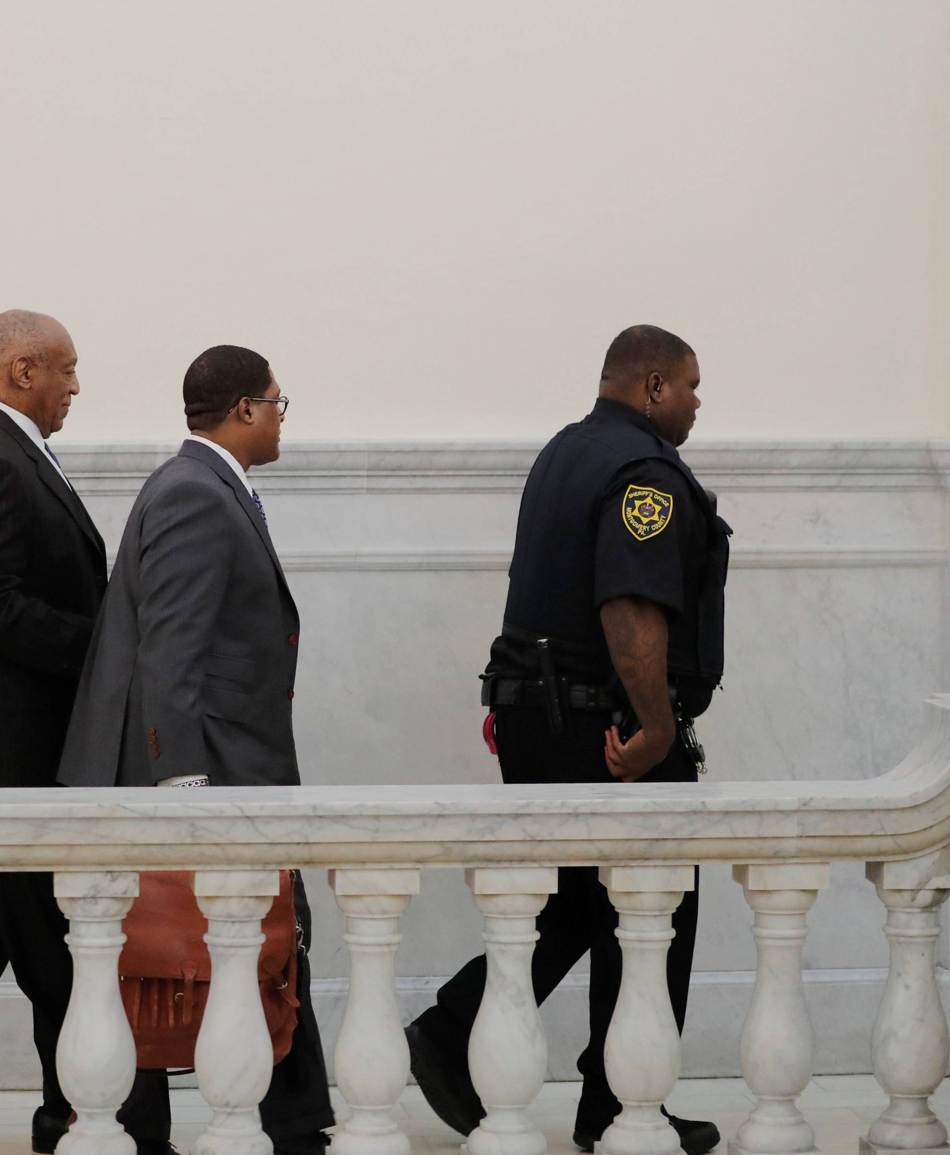 Actor and comedian Bill Cosby departs the courtroom during the first day of his sexual assault retrial at the Montgomery County Courthouse in Norristown, Pennsylvania