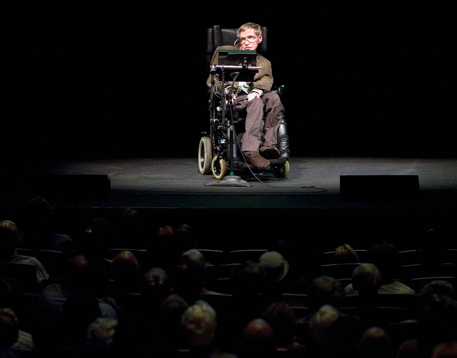 FILE PHOTO: Professor of mathematics at Cambridge University Stephen W. Hawking discusses theories on the origin of the universe in a talk in Berkeley