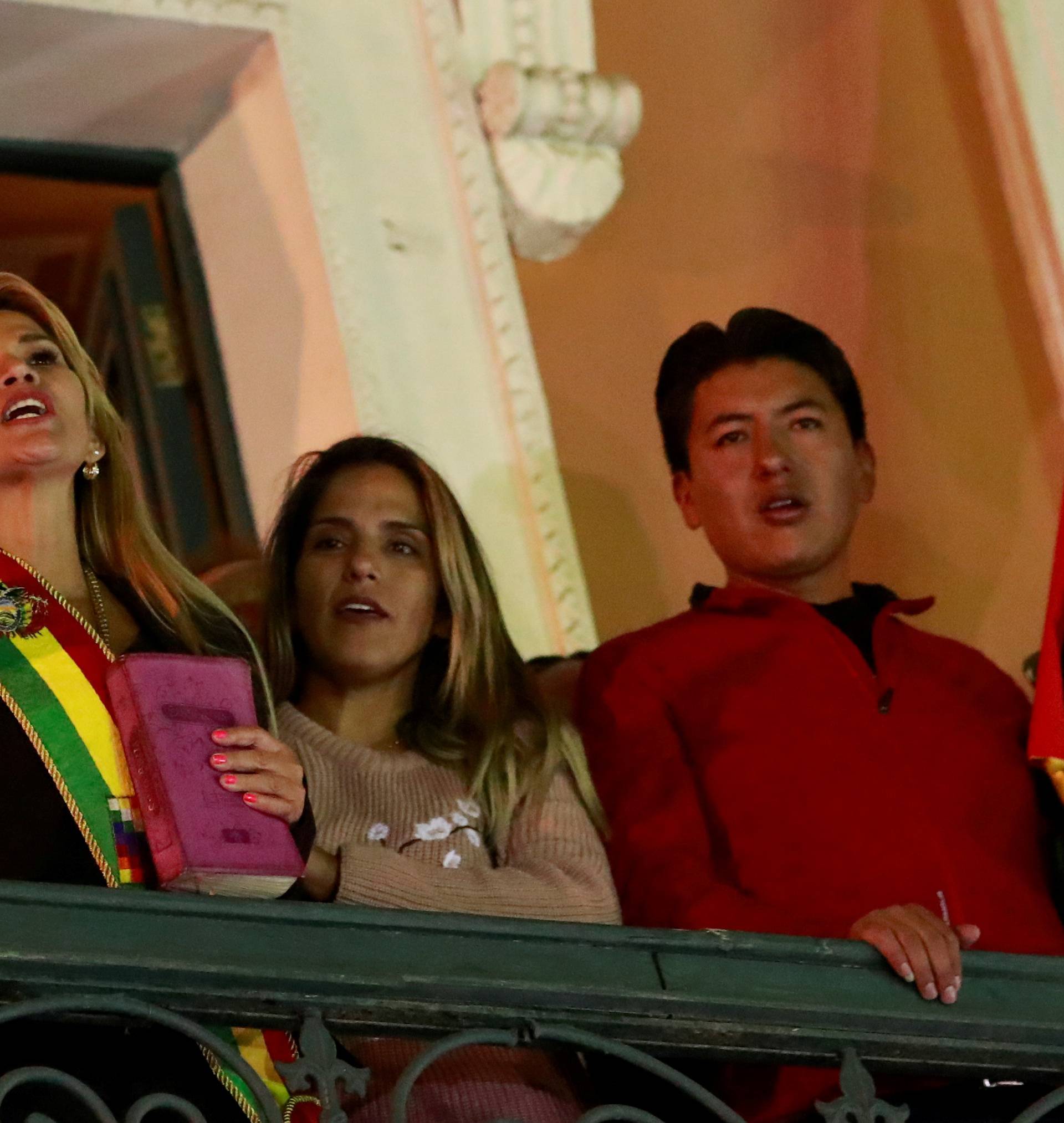 Bolivian Senator Jeanine Anez gestures after she declared herself as Interim President of Bolivia, at the balcony of the Presidential Palace, in La Paz