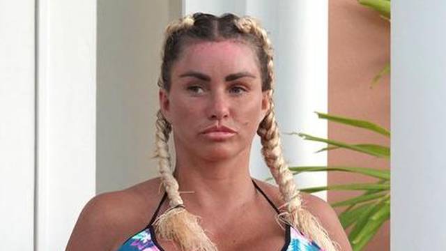 *EXCLUSIVE* WEB MUST CALL FOR PRICING  - Wearing her furry blue slippers and showing off the results of her biggest EVER boob job in her sexy multicoloured bikini, the British Glamour Model Katie Price is pictured enjoying her holiday in Thailand.*PICTUR