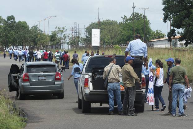 Workers of CVG attend a protest demanding the government to mantain pay scales, in Puerto Ordaz
