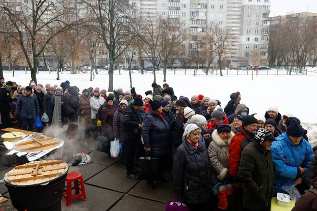 Residents cope with electricity, heating and water outages following Russian attacks on Ukraine's infrastructure in Kyiv