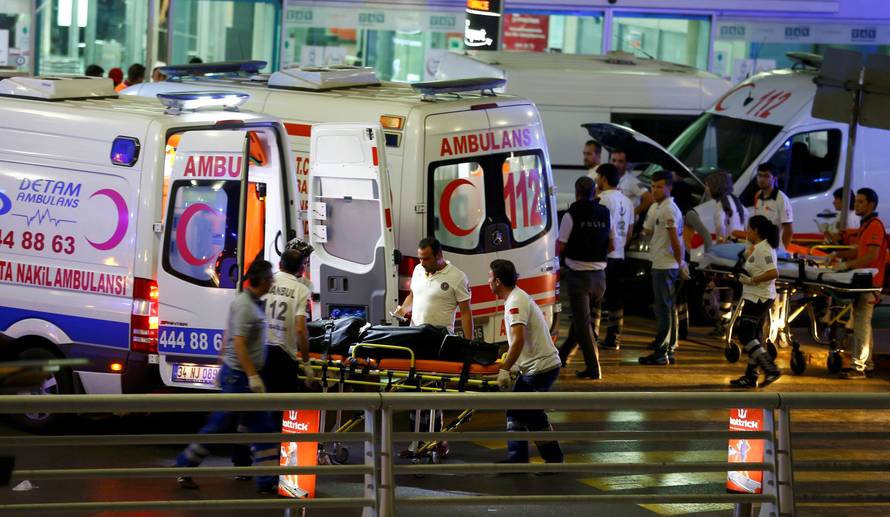 Paramedics push a stretcher at Turkey's largest airport, Istanbul Ataturk