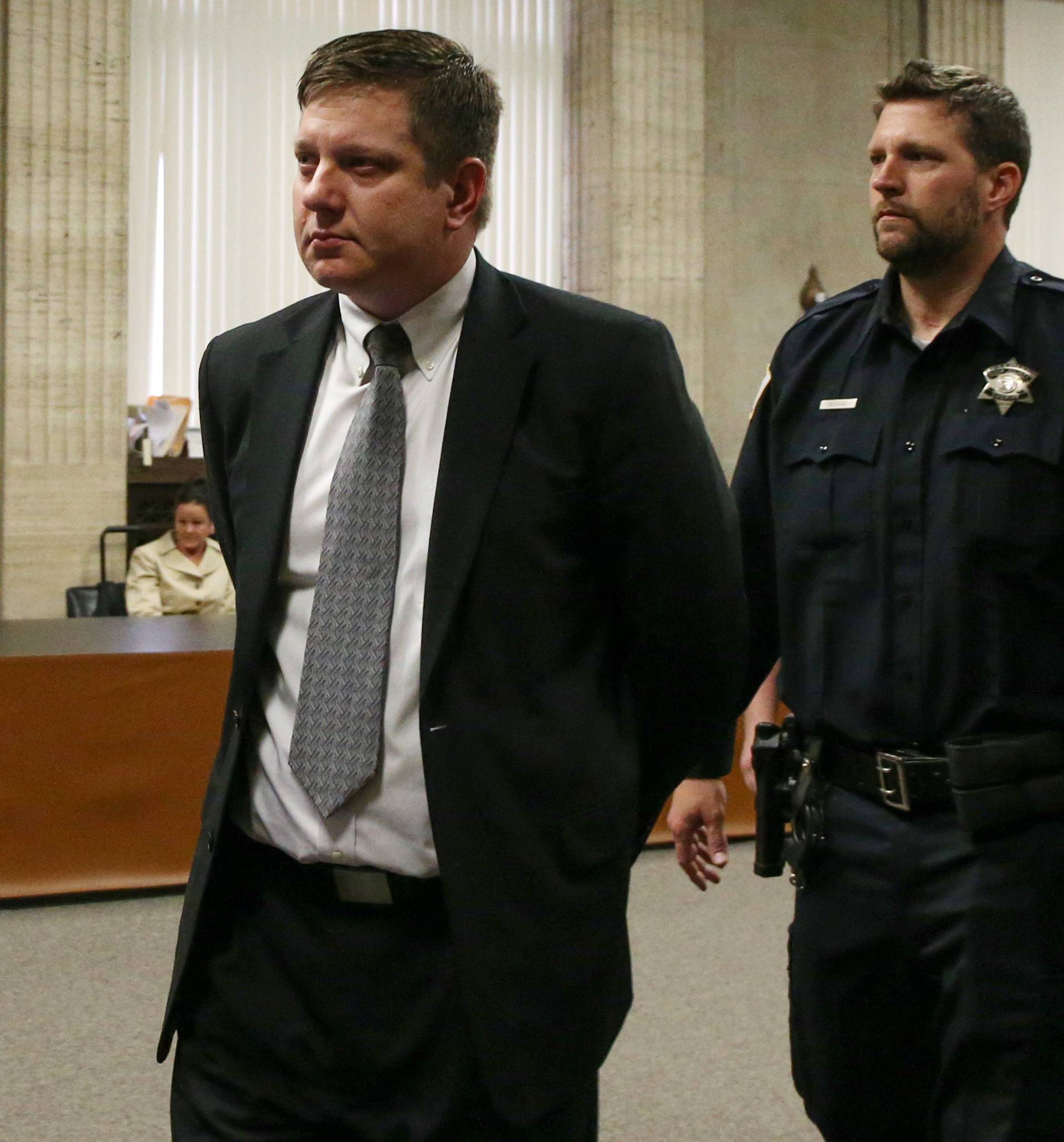 Chicago police Officer Jason Van Dyke is lead away in handcuffs after his guilty verdict in his murder trial in the shooting death of Laquan McDonald, in Chicago
