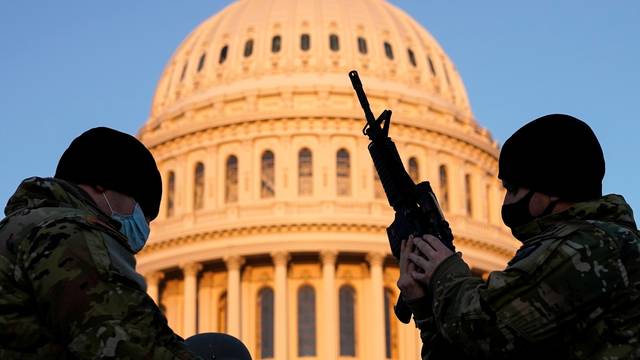 Members of the National Guard gather at the U.S. Capitol in Washington