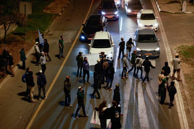 Israelis protest a ceasefire deal, in Jerusalem