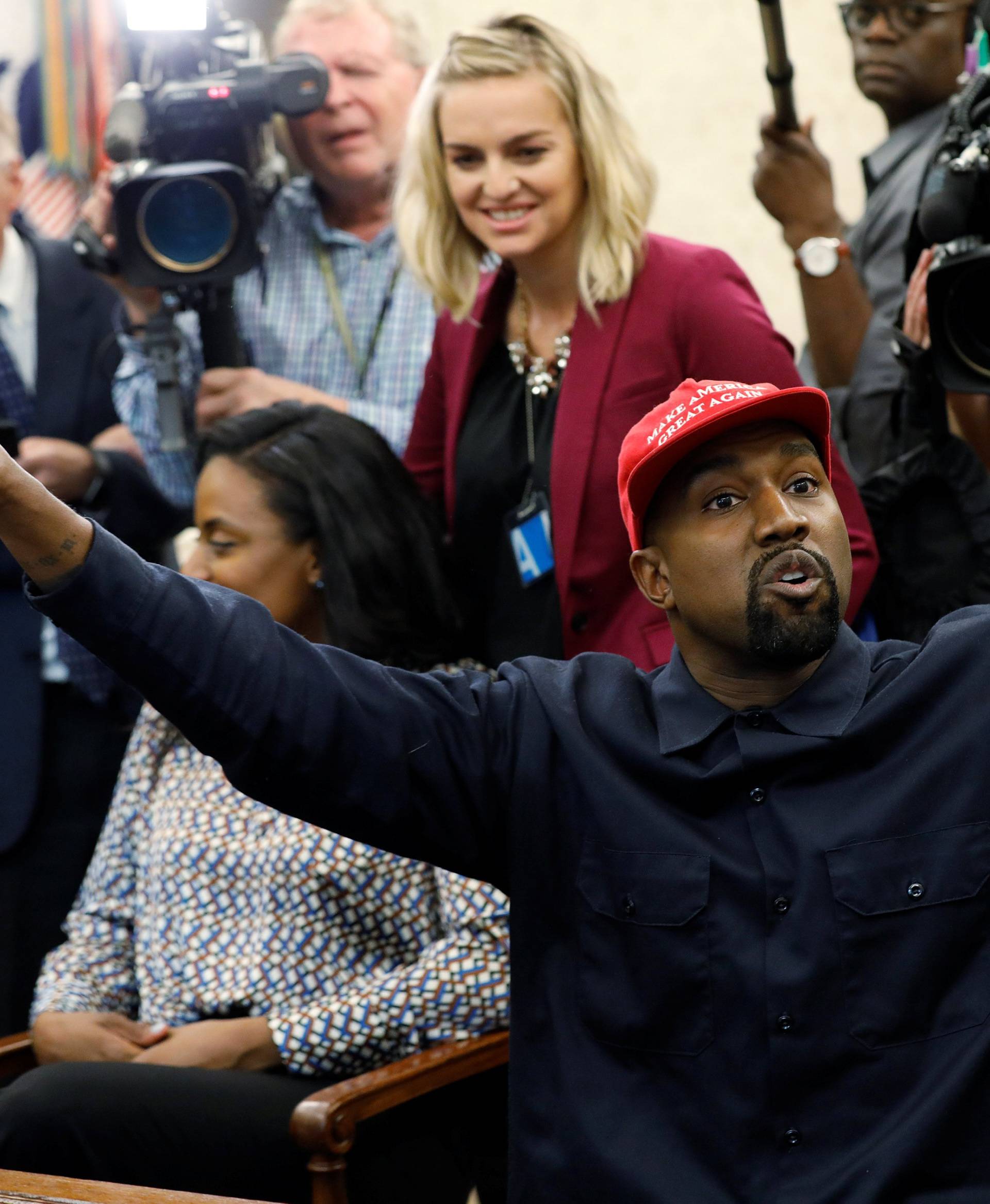 Rapper Kanye West speaks during a meeting with President Trump in the Oval Office of the White House in Washington