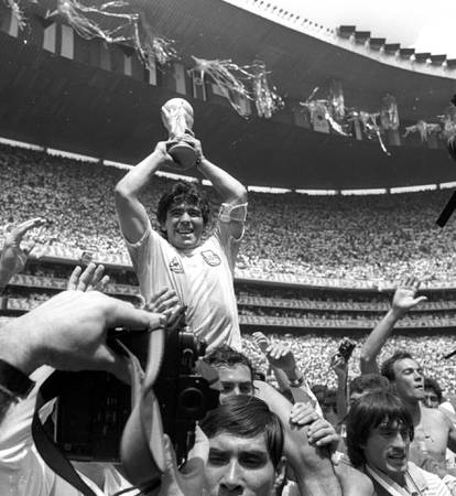 FILE PHOTO: ARGENTINA'S MARADONA LIFTS THE WORLD CUP AFTER MATCH AGAINST WEST GERMANY IN MEXICO.