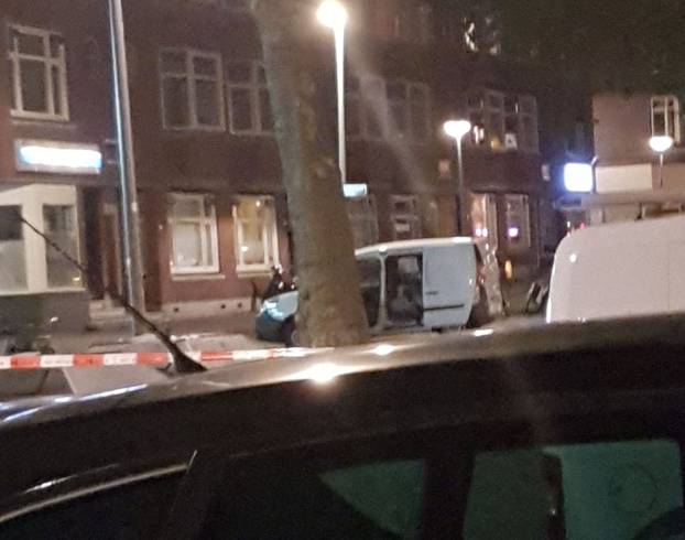 Police investigate a van with Spanish licence plates containing gas canisters which was found near a Rotterdam venue where a rock concert was cancelled
