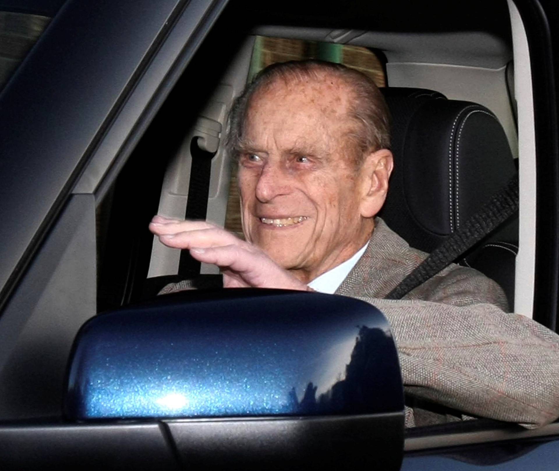 FILE PHOTO: Britain's Prince Philip is driven away from Papworth Hospital in southern England
