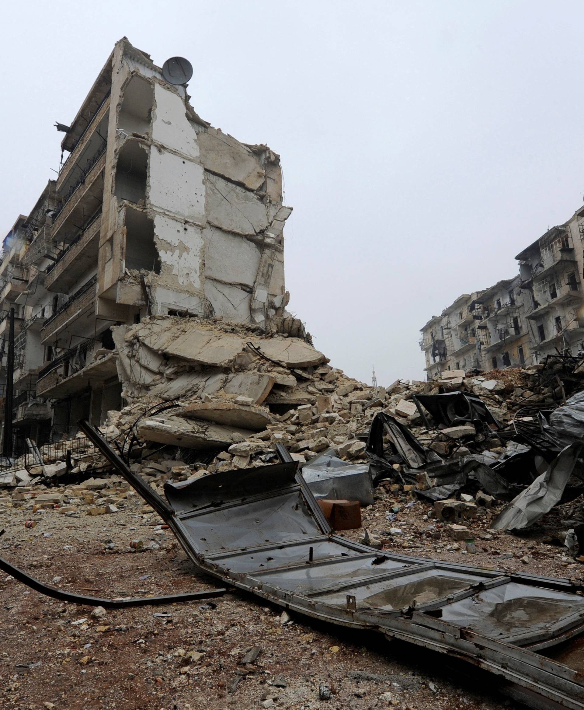 A general view shows the damage in the government-held al-Shaar neighborhood of Aleppo