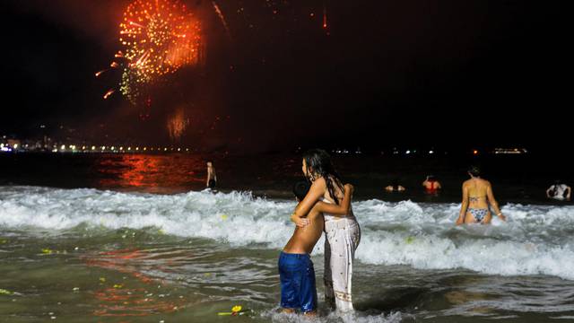 Revellers welcome the New Year at Copacabana beach