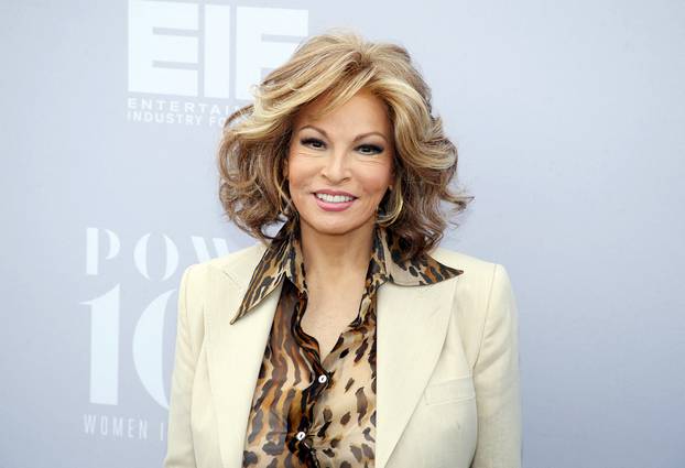 FILE PHOTO: Actress and singer Raquel Welch poses at The Hollywood Reporter's Annual Women in Entertainment Breakfast in Los Angeles
