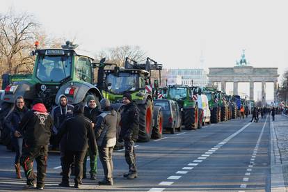 German farmers protest against the cut of vehicle tax subsidies in Berlin