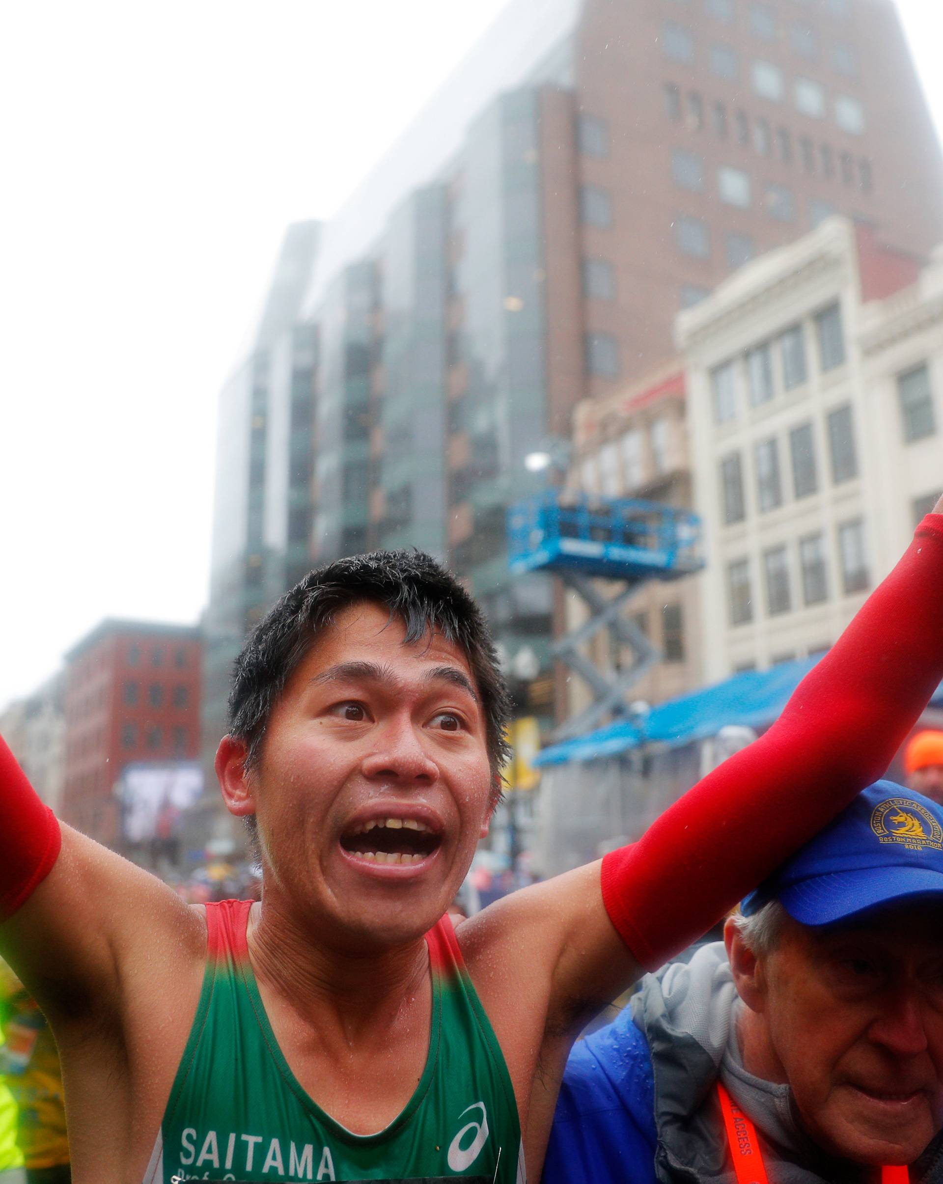 Yuki Kawauchi of Japan celebrates after winning the men's division of the 122nd Boston Marathon in Boston