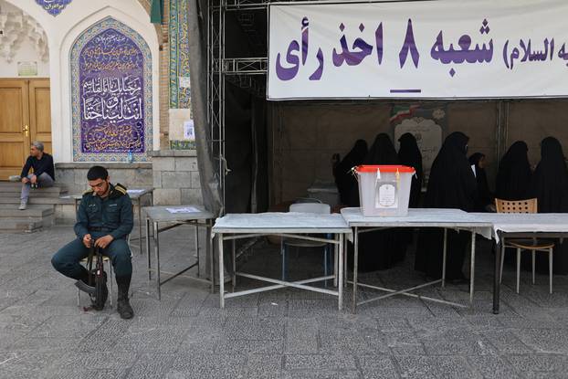 Iranians vote in run-off presidential election