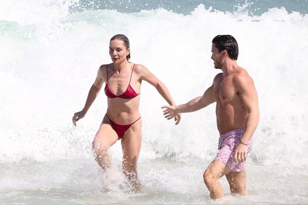 *PREMIUM-EXCLUSIVE* Hunter Biden's Wife Melissa Cohen looks fit and fabulous in a tiny red bikini as she relaxes in Rio de Janeiro!