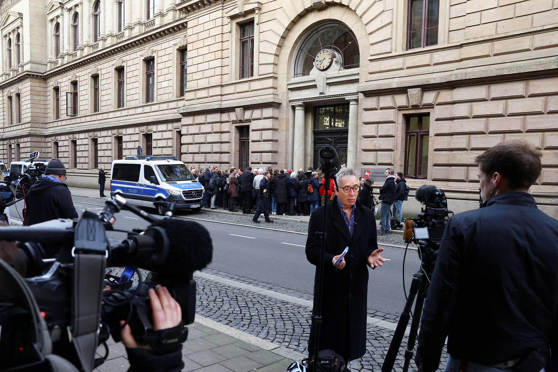 Man, suspected in the disappearance of British toddler Madeleine McCann in Portugal, stands trial in Germany on unrelated sexual assault charges, in Braunschweig