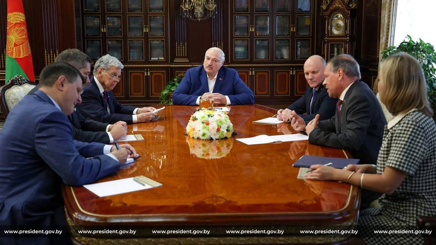 Belarusian President Alexander Lukashenko meets with John Coale, a representative of U.S. President Donald Trump, in Minsk