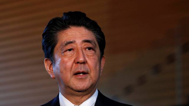 Japan's Prime Minister Shinzo Abe speaks to media after the news conference by the U.S. President Donald Trump, after the summit between the U.S. and North Korea, in Tokyo