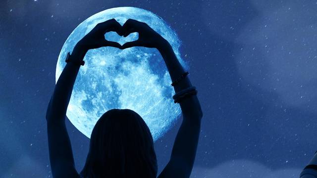 Girl holding a heart - shape with telescope, Moon and stars. My astronomy work.