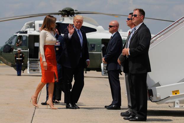 Trump arrives to board Air Force One for his first international trip as president from Joint Base Andrews