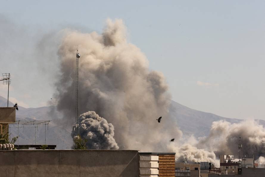 Smoke rises following an explosion, after Israel and the U.S. launched strikes on Iran, in Tehran
